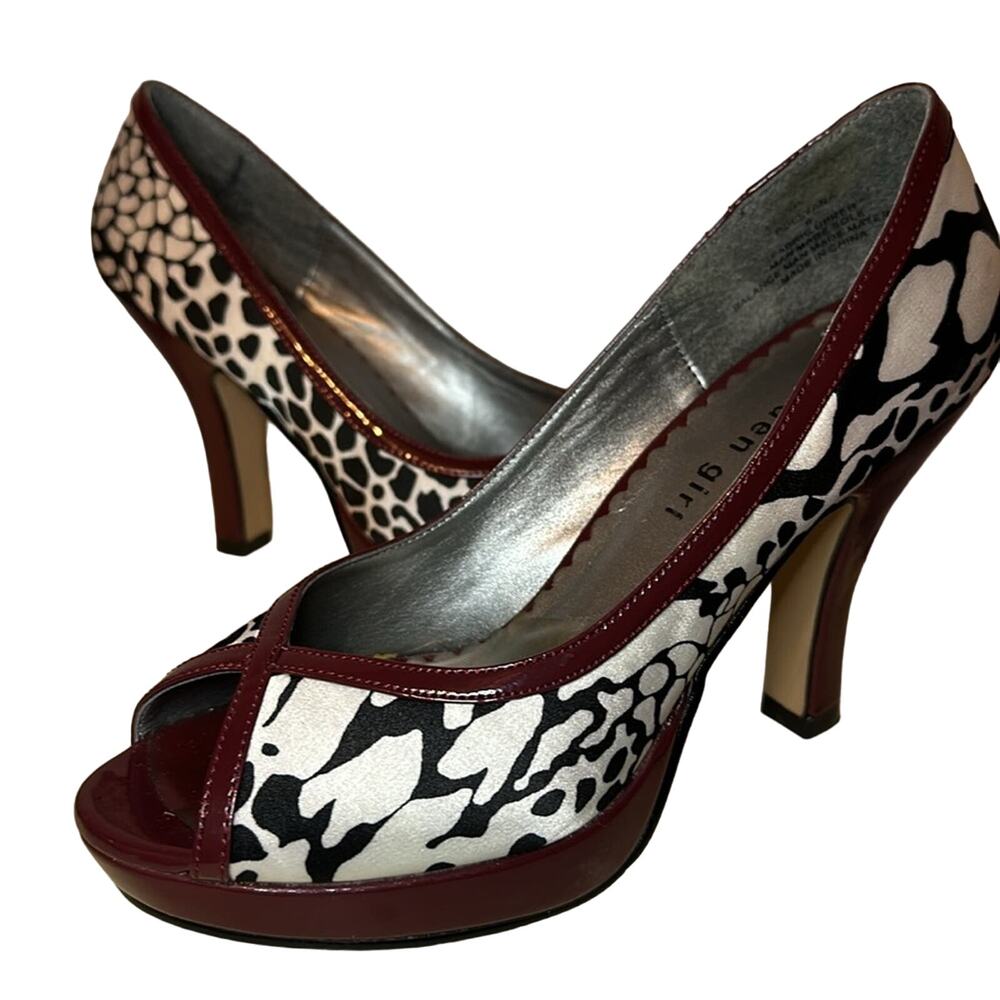 Madden Girl Platform Pumps. Black and white with red accent Zebra